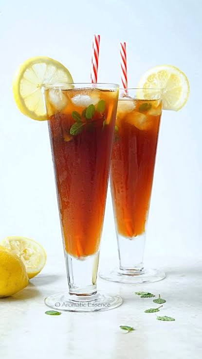 Iced cold beverages with lemon and mint