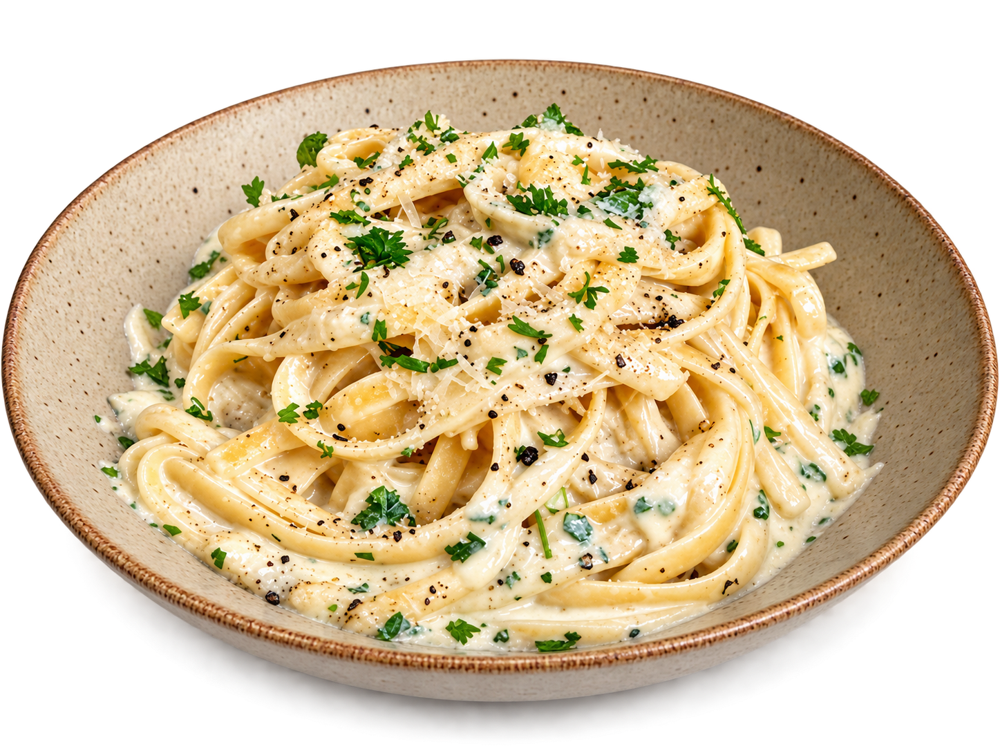 Creamy pasta in a bowl with Parmesan and herbs